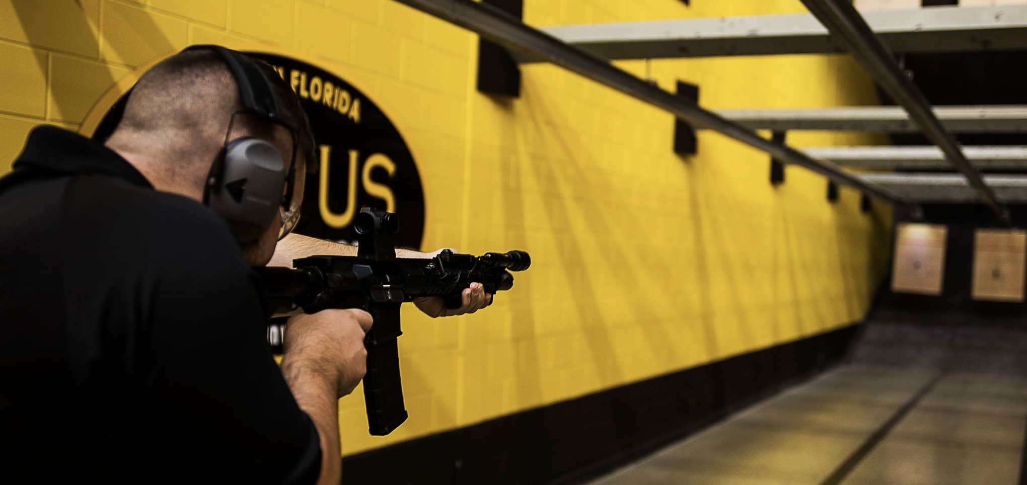 Member training with rifle at Jensen Beach range